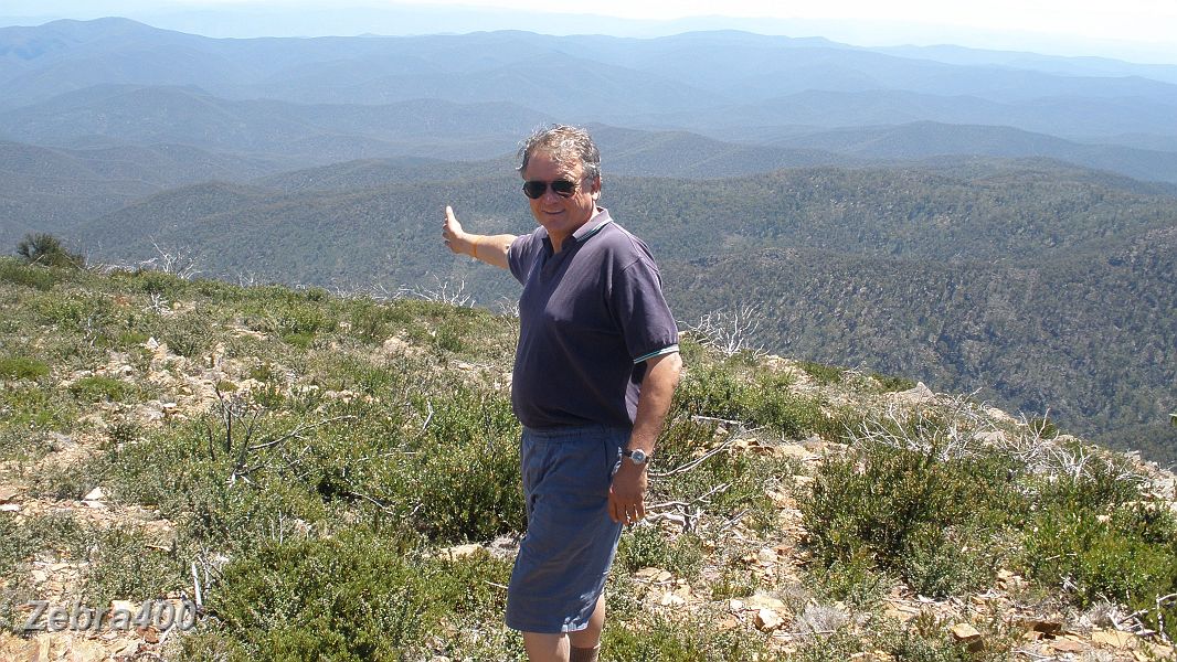 16-Kevin points out Mt Kosciuszko from Mt Tingaringy.JPG